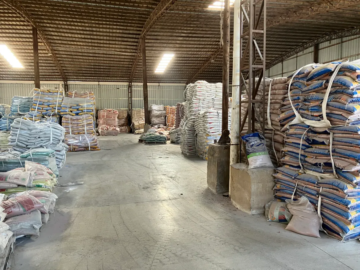 Warehouse storage area with organized EPDM granule bags and order materials