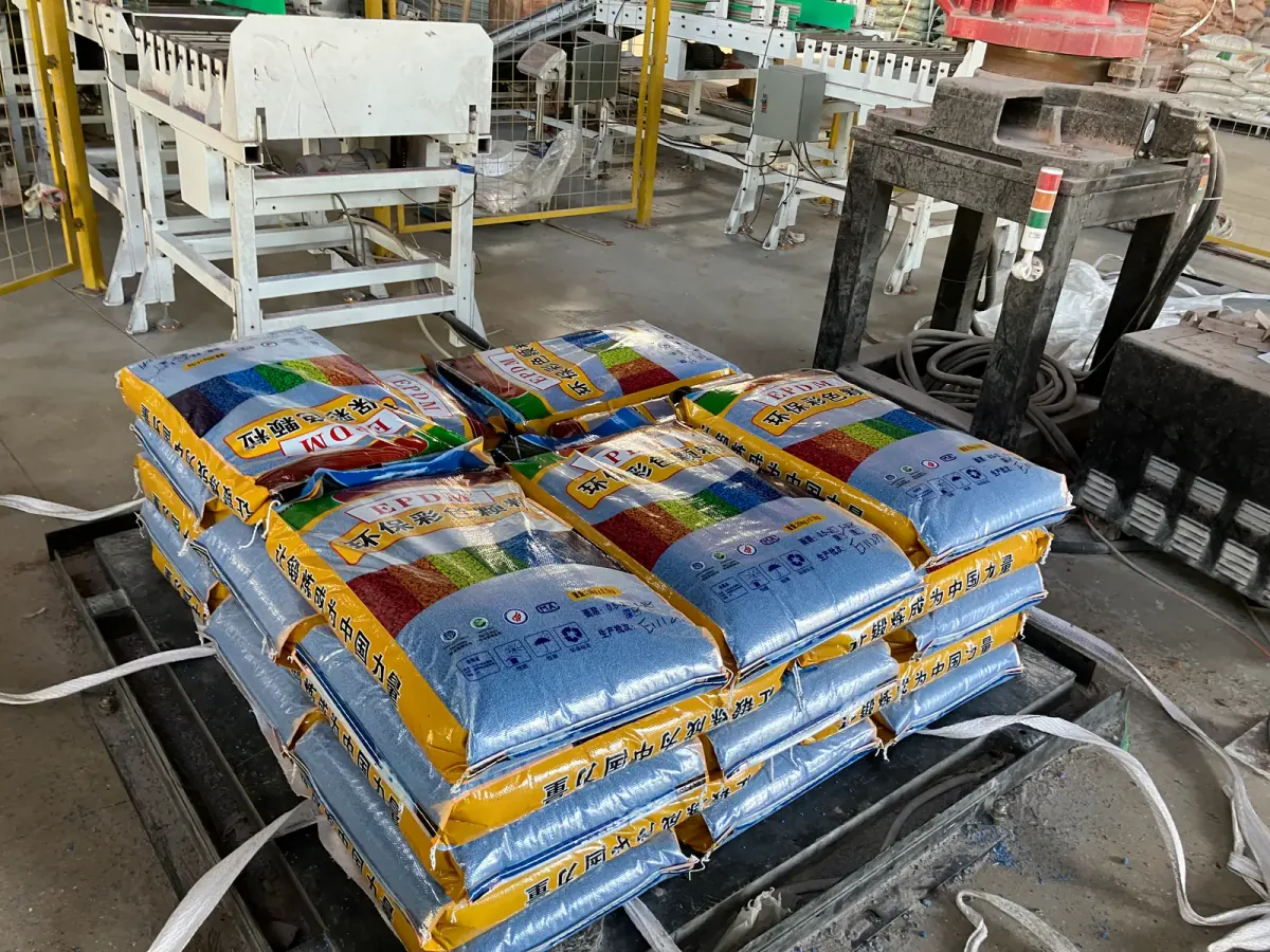 Bagged EPDM granules arranged near a material handling and packaging area