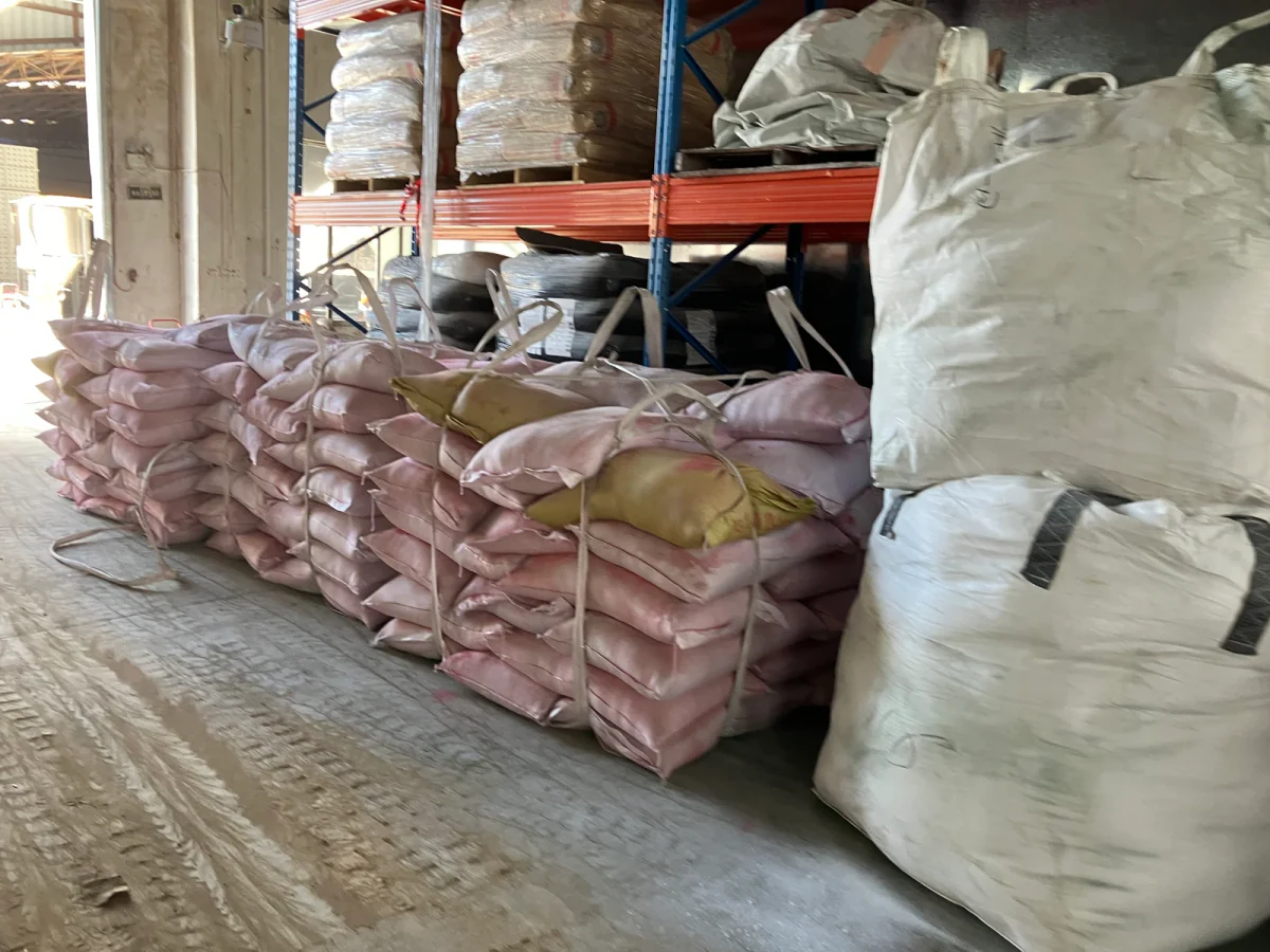 Bagged EPDM granules grouped for warehouse handling and order staging